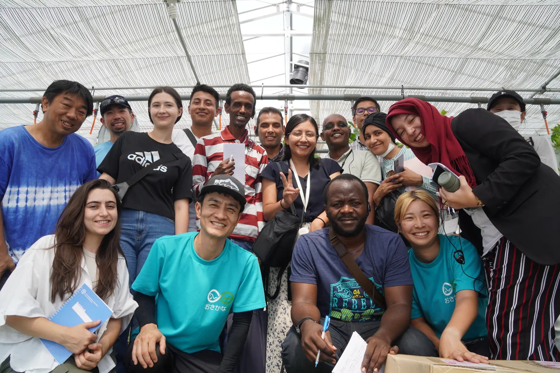 A guided group visiting an aquaponic farm